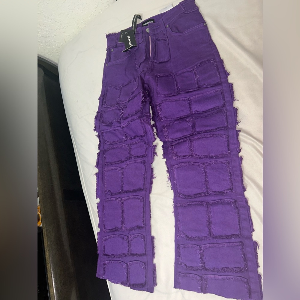 Purple stacked jeans
